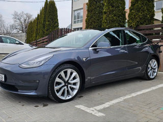 Tesla Model 3 фото 1