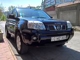 Nissan X-Trail foto 2