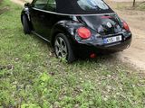 Volkswagen New Beetle foto 1