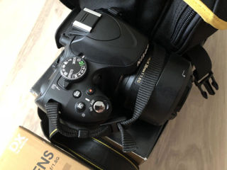 Nikon D5100 DSLR + AF-S DX Nikkor 35mm f/1.8G foto 1
