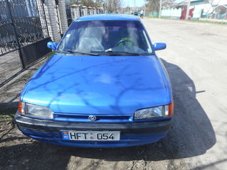 Mazda 323 foto 1