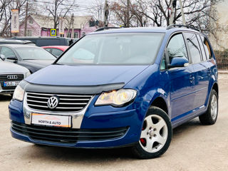 Volkswagen Touran foto 1