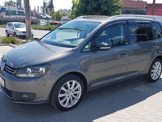 Volkswagen Touran foto 1