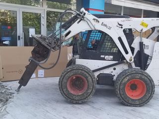 Bobcat cu demolator Бобкэт с гидромолота