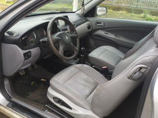 Nissan Almera foto 9