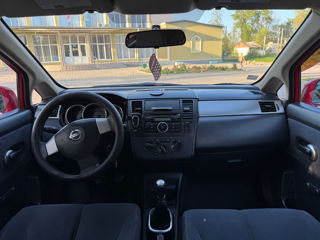Nissan Tiida фото 6