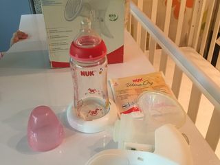 Молокоотсос стеклянный почти новый фирмы Nuk - 400L foto 2