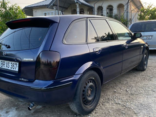 Mazda 323 фото 3