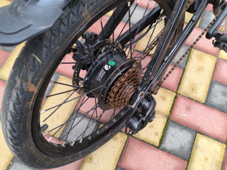 Bicicletă electrică foto 4
