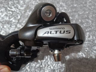 Задний переключатель Shimano Altus RD - M310 подходит для 6-ти для 7-ми и 8-ми скоростных трансмисси