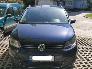 Volkswagen Touran foto 1