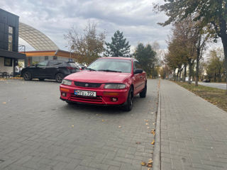 Mazda 323 foto 1