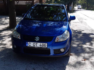 Suzuki SX4 foto 1