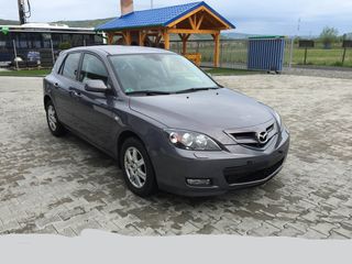 Mazda 3 foto 1