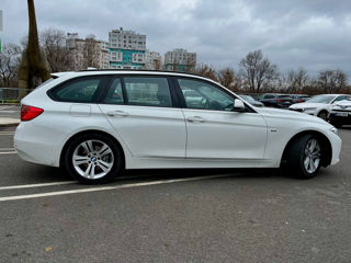 BMW 3 Series Touring foto 3