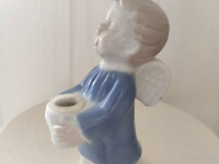 Vind figurine foto 9