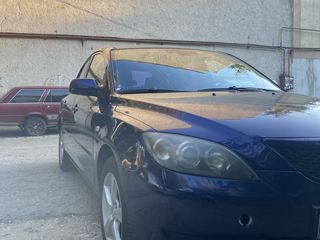 Mazda 3 foto 1