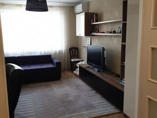 Apartament cu trei odăi cu reparație noua si mobila la comanda pe strada Albisoara. foto 2