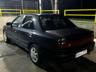 Mazda 323 foto 3