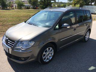 Volkswagen Touran foto 1