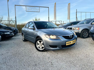 Mazda 3 foto 1