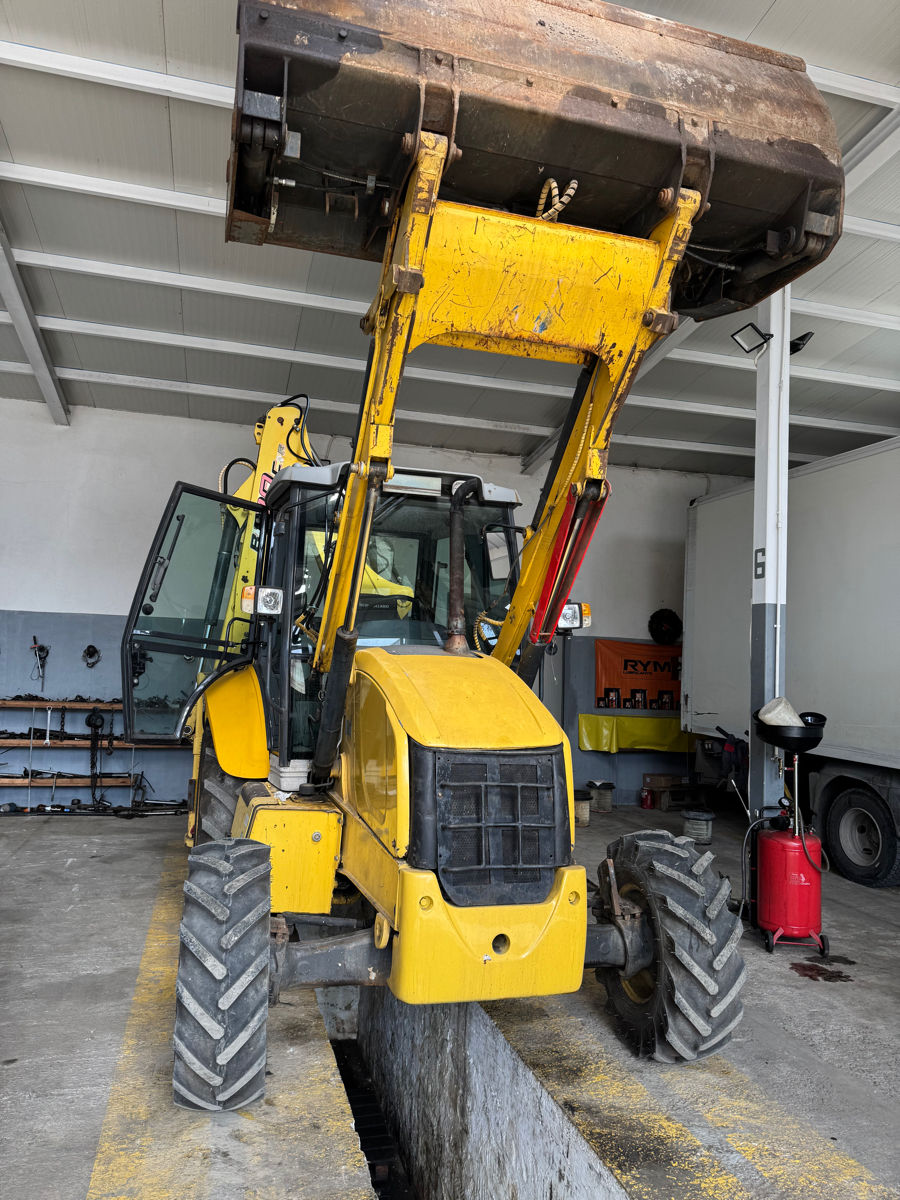 Buldoexcavator New Holland B100