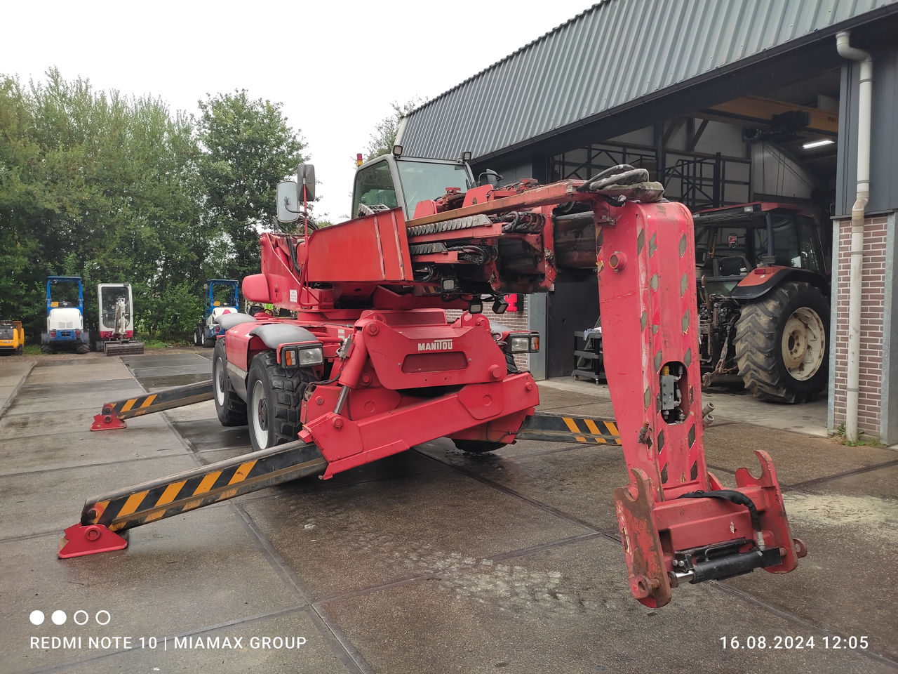 Телескопический погрузчик с поворотной башней Manitou MRT 2145, 2001 foto 0