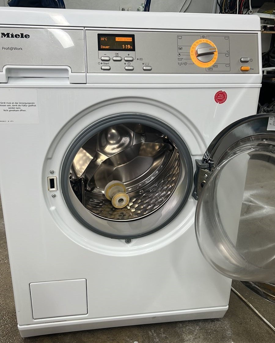 Профессиональная стиральная машина Miele фото 1