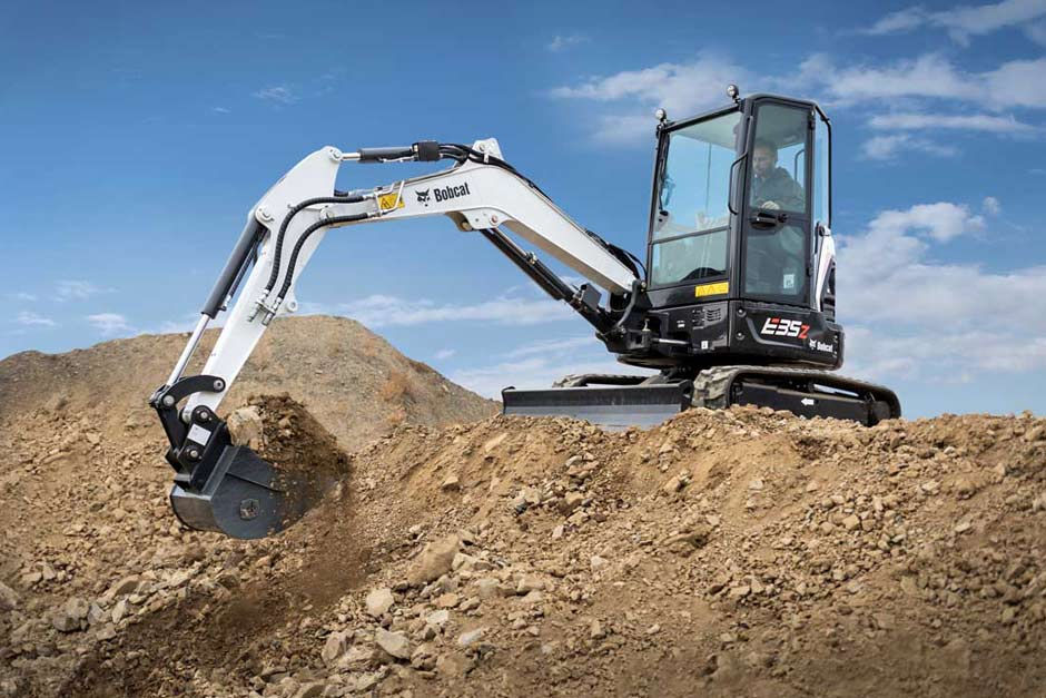 Bobcat excavator basculante gama de intrumente foto 15