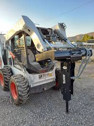Bobcat excavator basculante gama de intrumente foto 1
