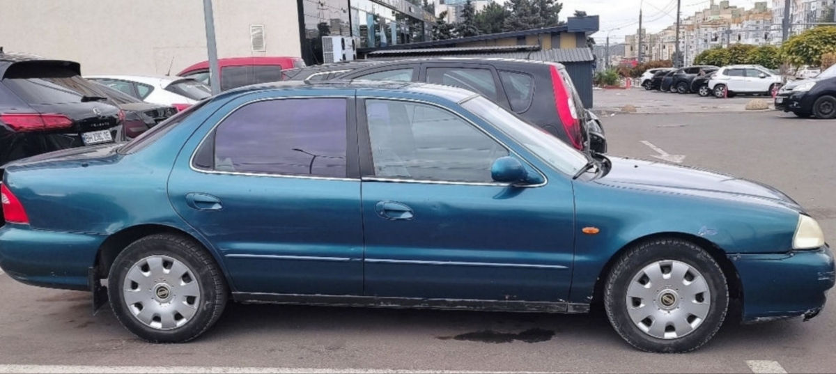 KIA Clarus фото 2
