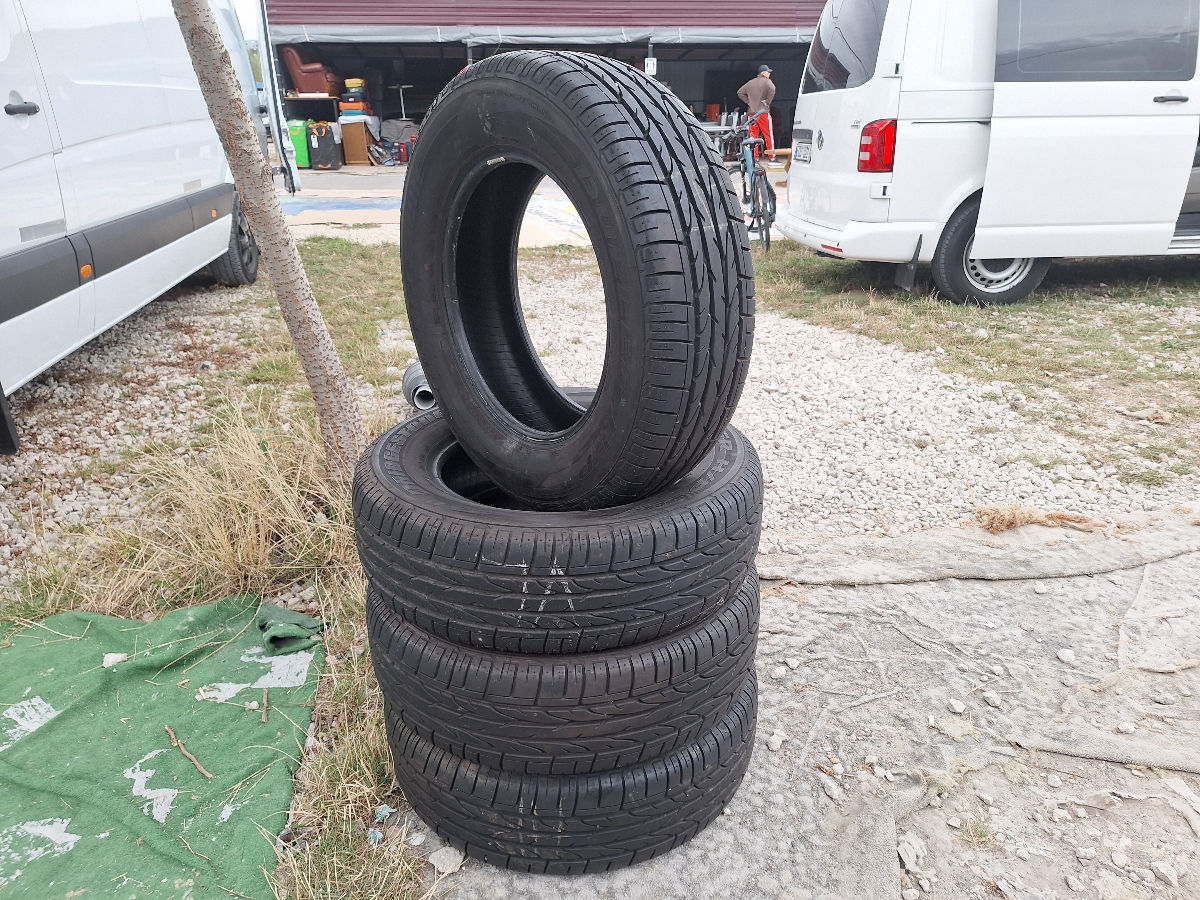 Anvelope Volkswagen Transporter, Bridgestone Dueler H/P Sport,  215/65 R16, aduse din Germania foto 0