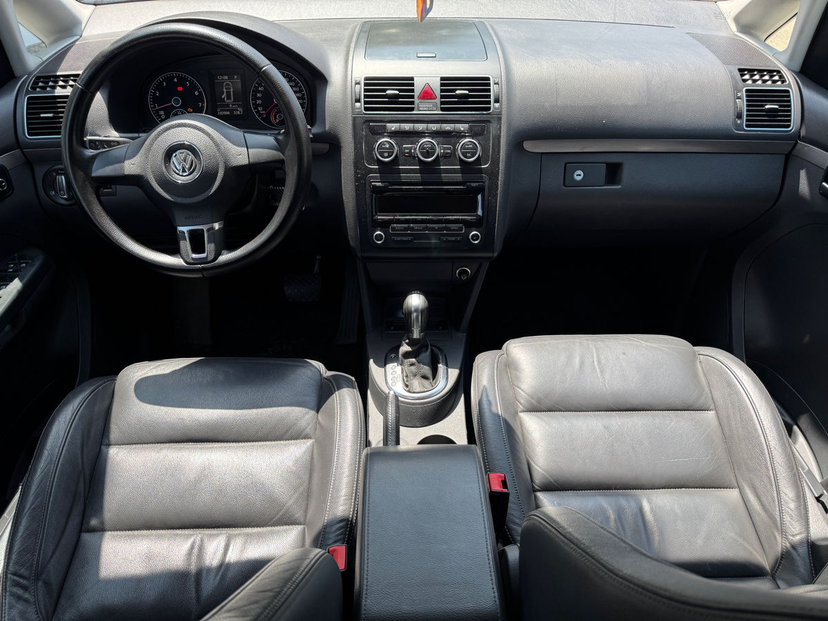 Volkswagen Touran фото 6