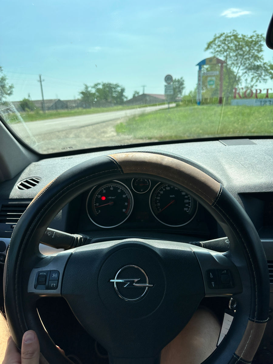 Opel Astra фото 7
