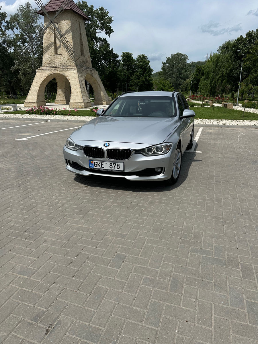 BMW 3 Series Touring foto 0