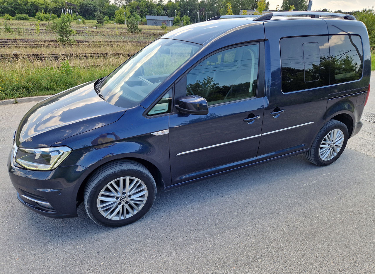 Volkswagen Caddy фото 1