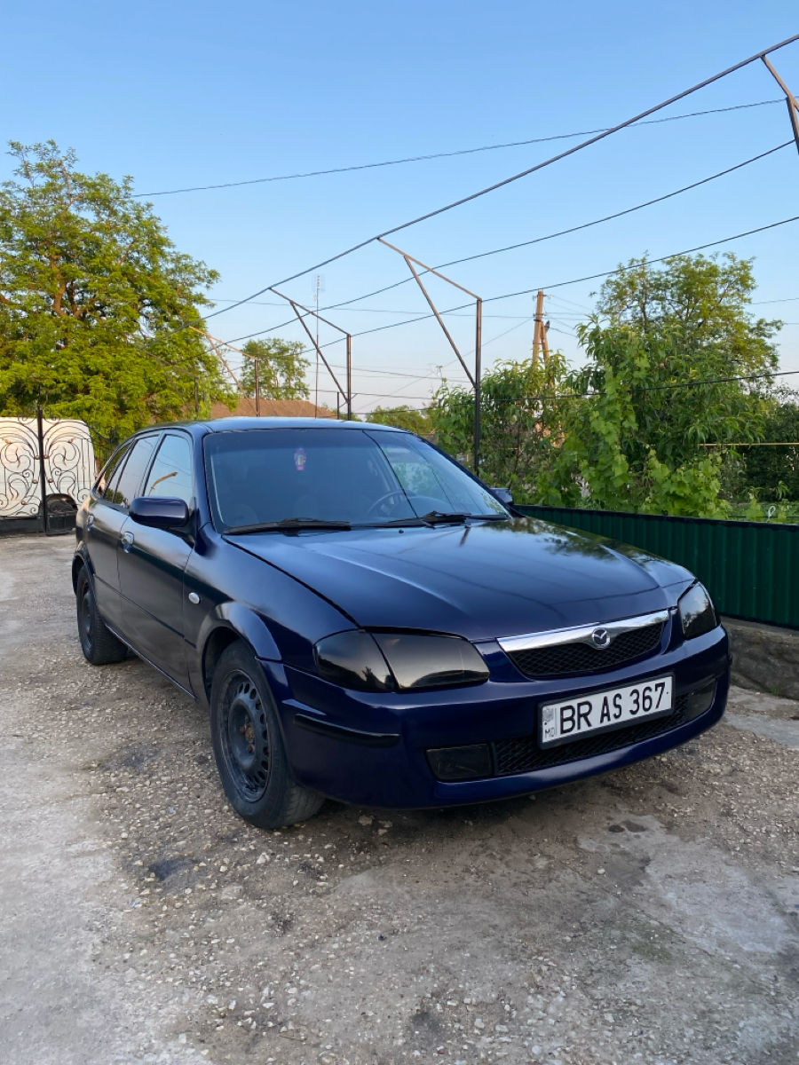 Mazda 323 фото 0