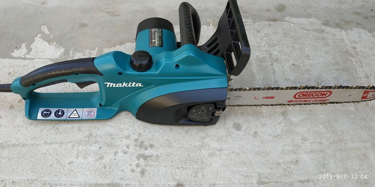 Цепная пила электрическая Makita UC3520A б/у