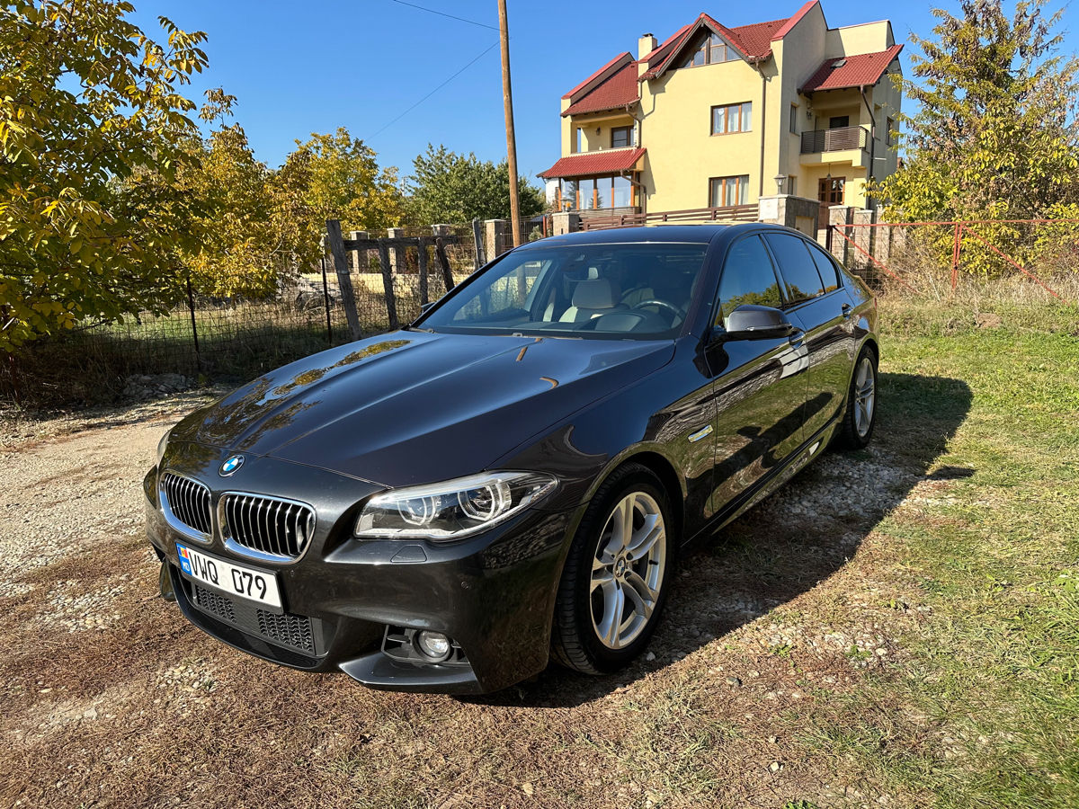 BMW 5 Series foto 1