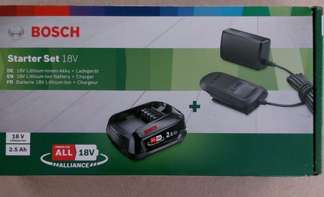 Bosch комплект аккумулятор и зарядка foto 1