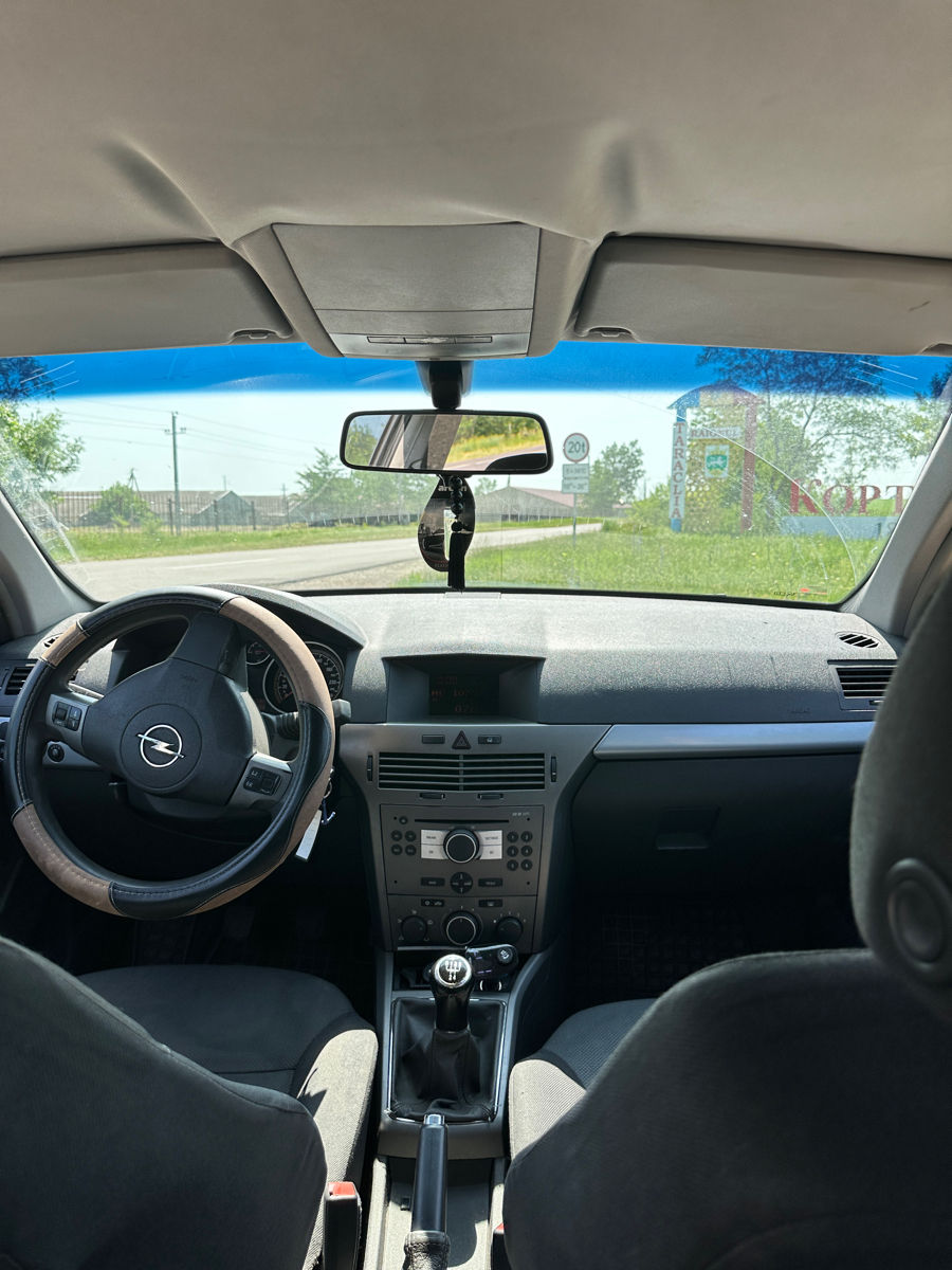 Opel Astra фото 5