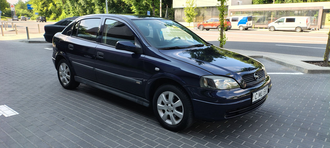 Opel Astra фото 2