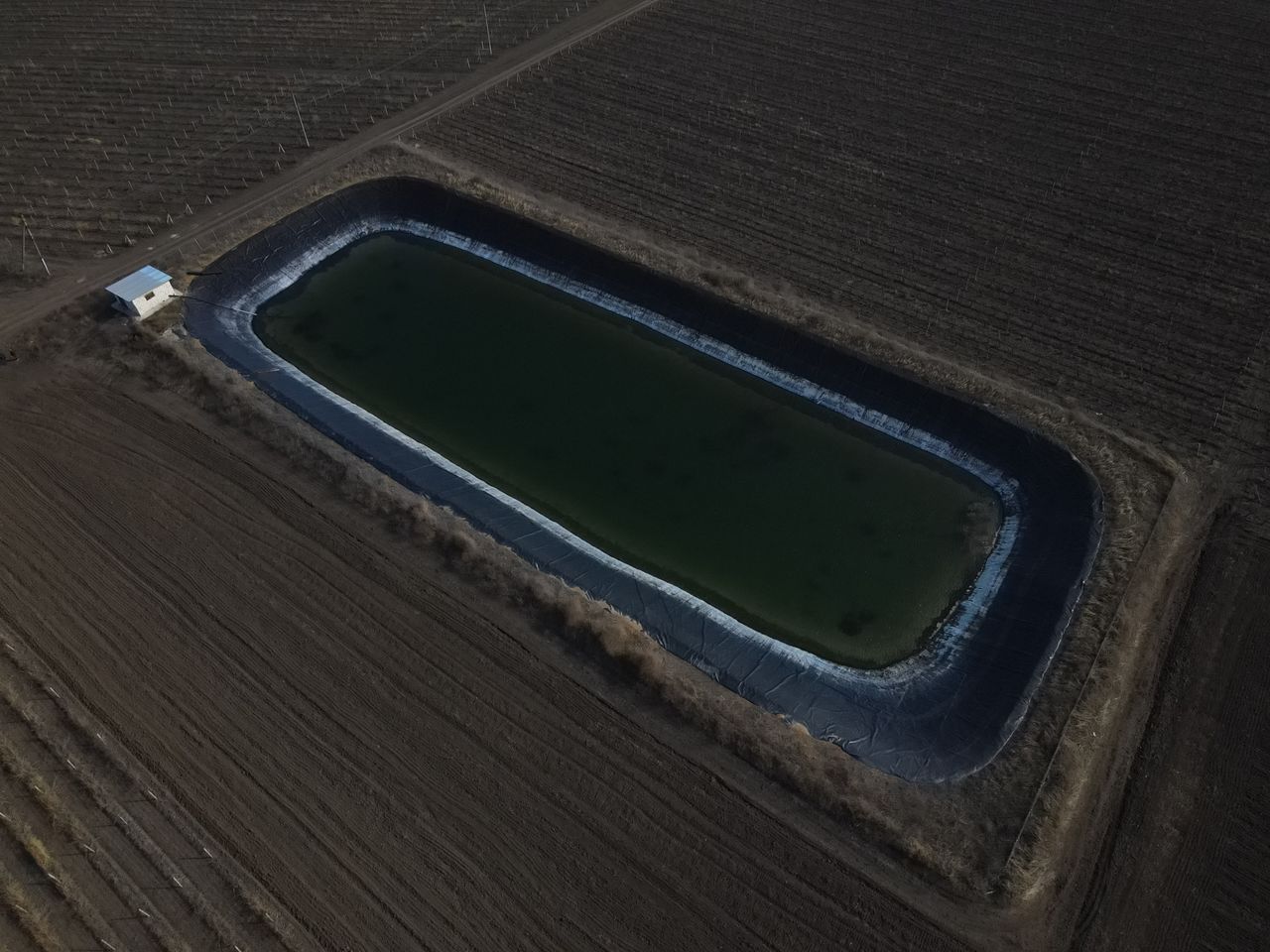 Bazine cu geomembrana pentru acumularea apei- proiectare- constructie la cheie foto 5