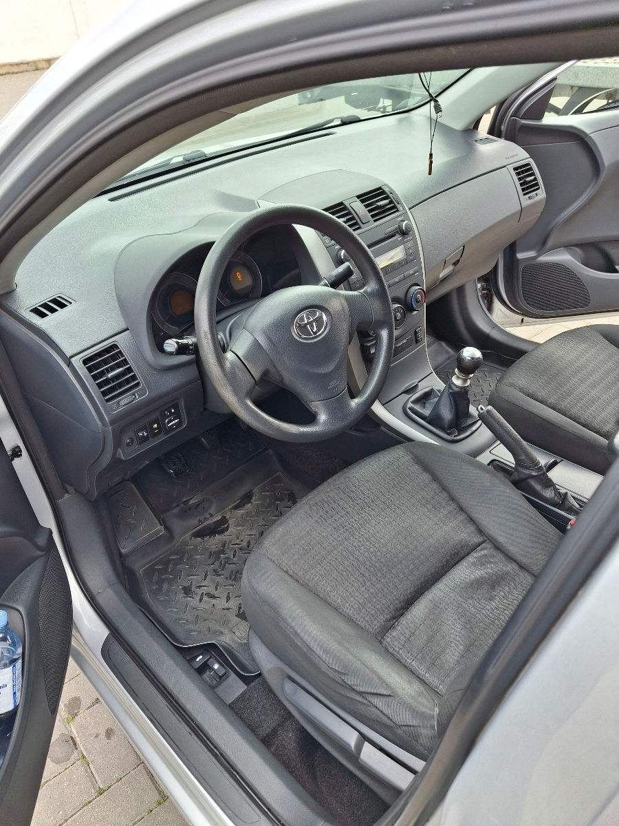 Toyota Corolla фото 6