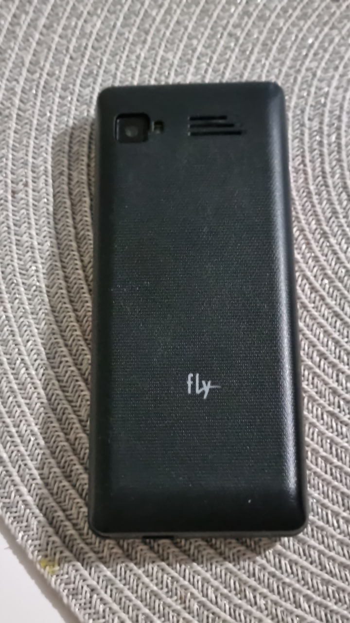 FLY TS 114 ( 3 - sim карты ) фото 1