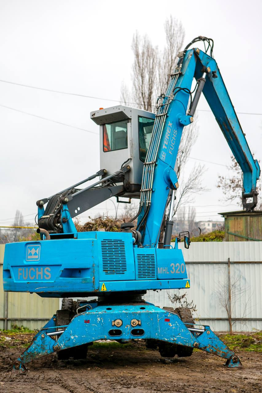 Перегружатель Fuchs MHL 320 фото 7