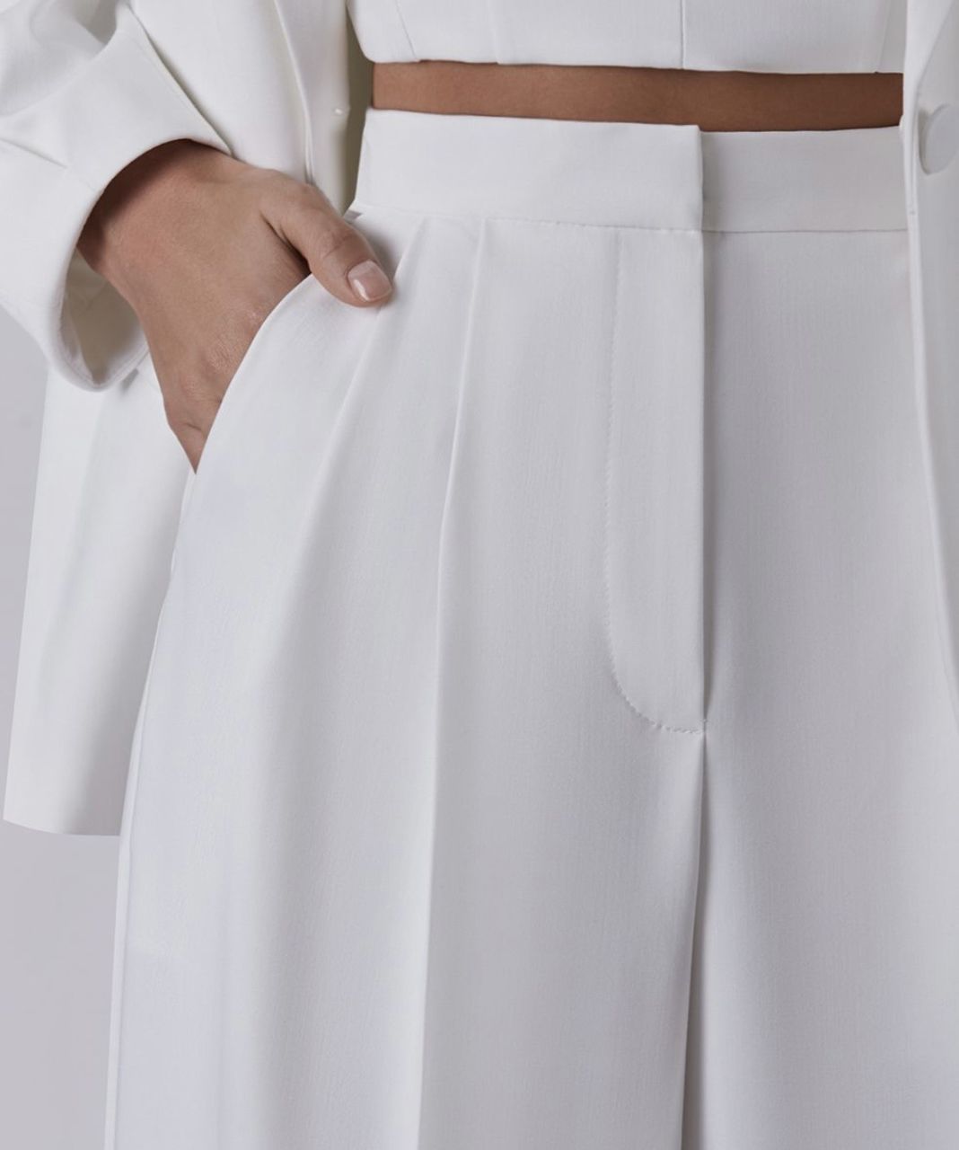 Новый белоснежный костюм, корсетный топ, широкие брюки. foto 4
