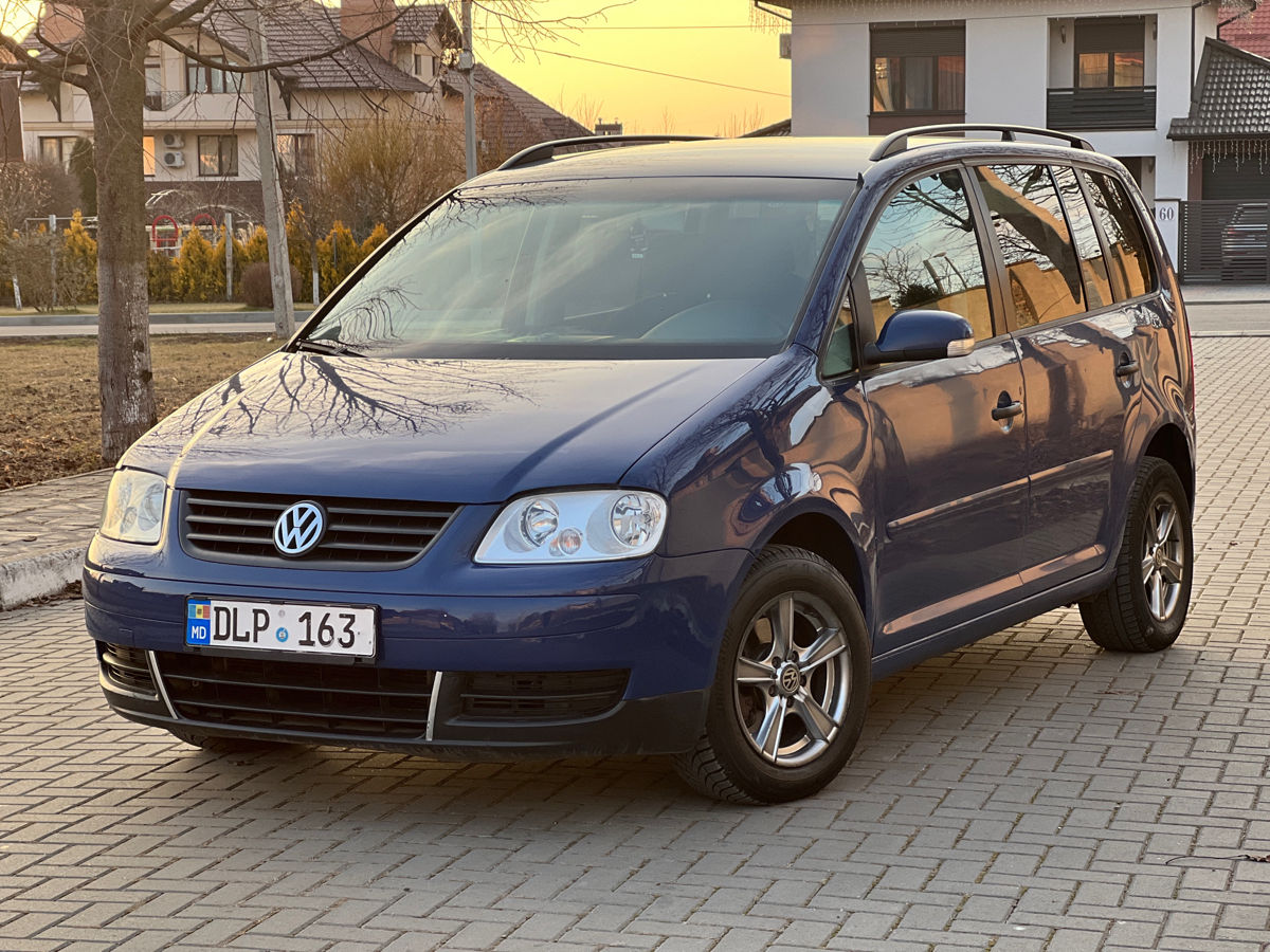 Volkswagen Touran фото 3