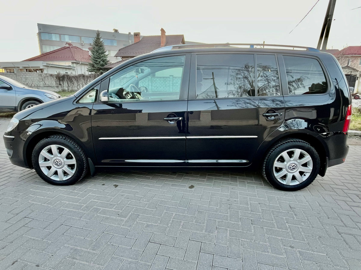 Volkswagen Touran фото 3