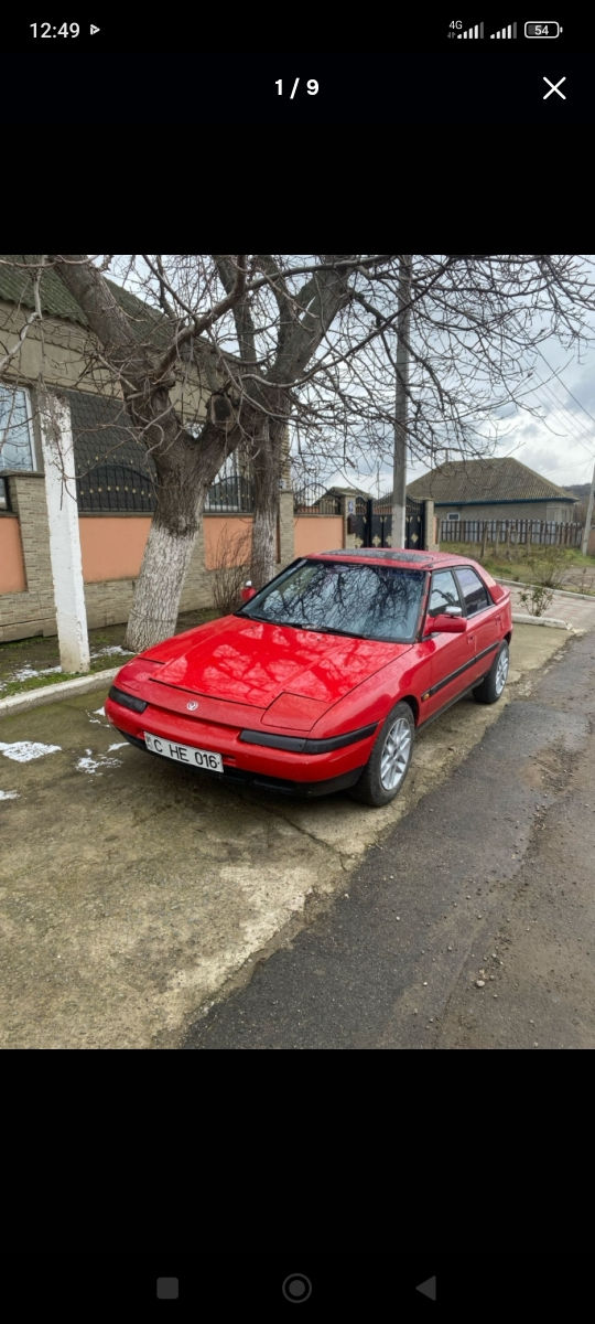 Mazda 323 фото 0